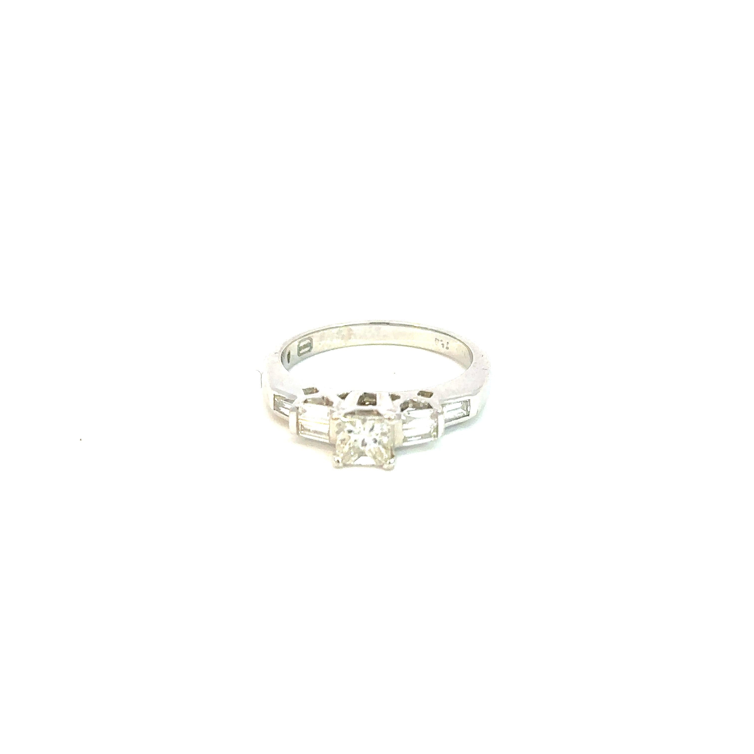 Ring 18KWGOLD s/w Princess &Bagget Diamond.