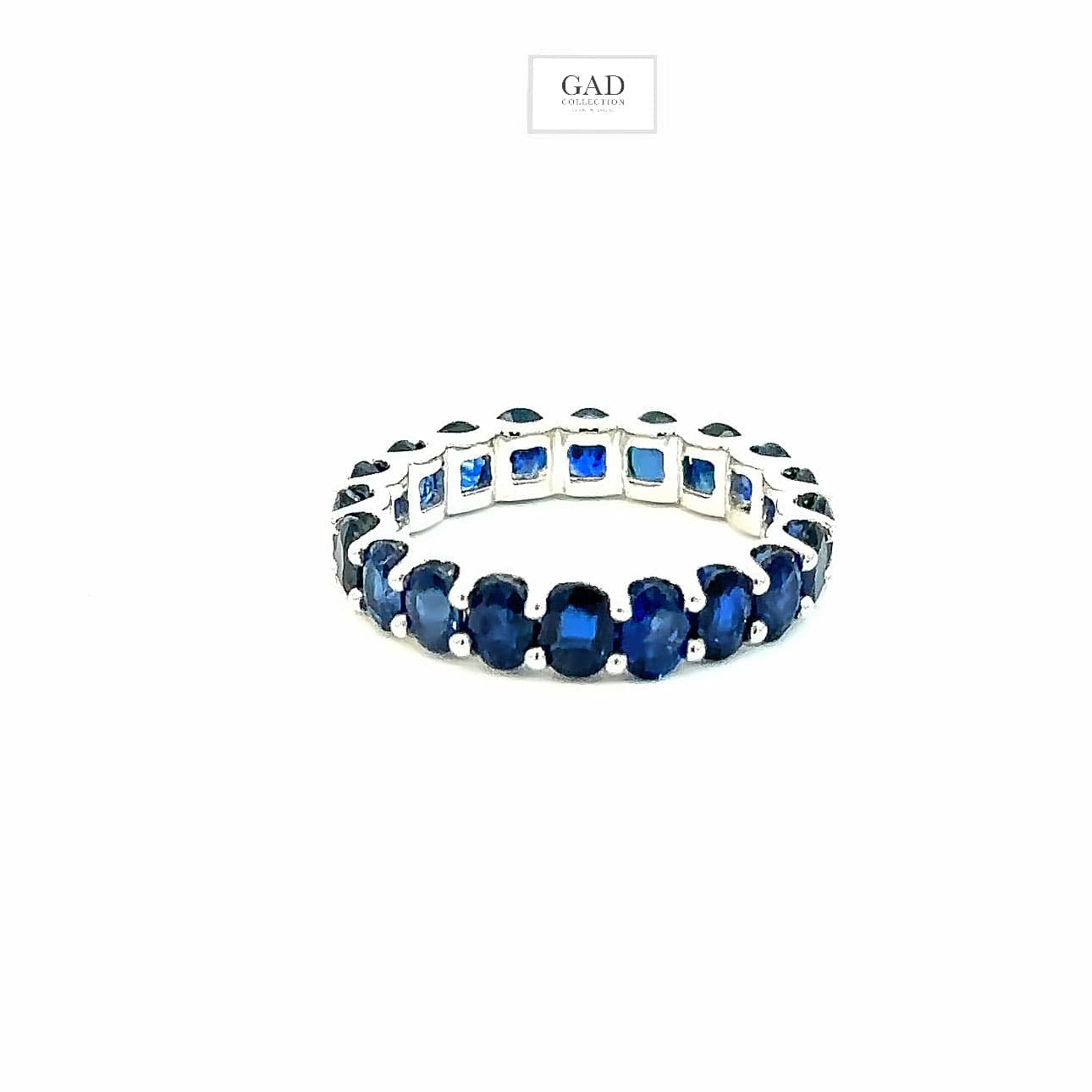 Eternity ring 14KWGOLD with Oval Blue Sapphire