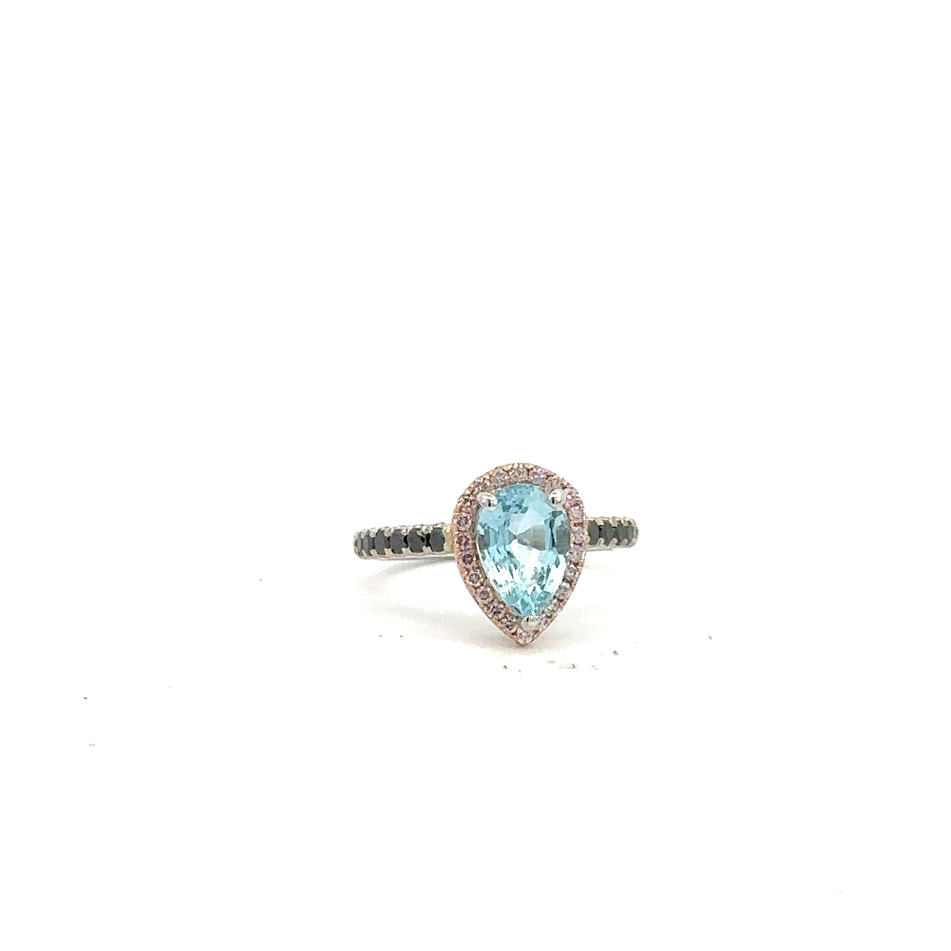 A Ring s/w Aquamarine pear shape & Pink &black diamond diamond