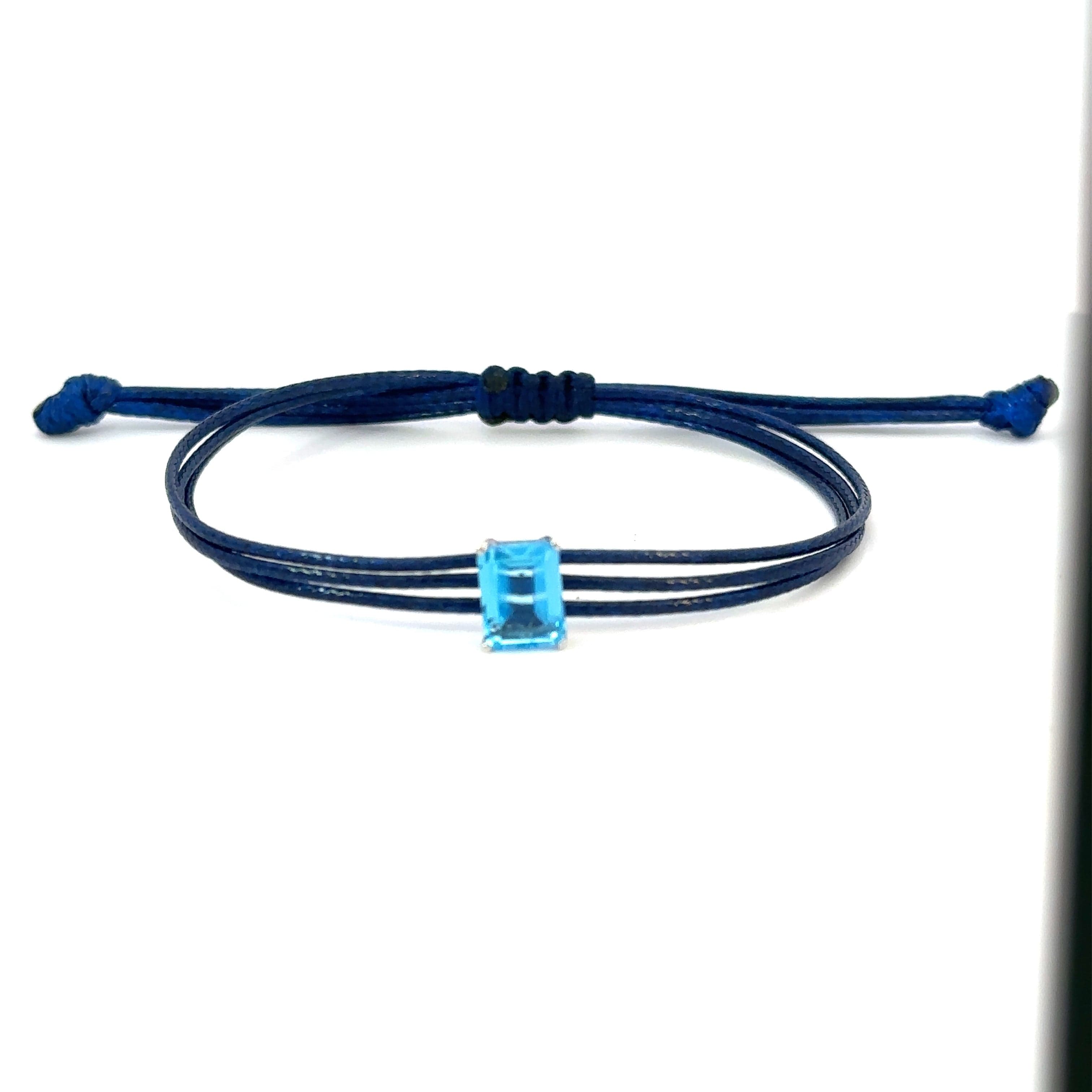 Braided bracelet with Blue Topaz and 14k white gold.
