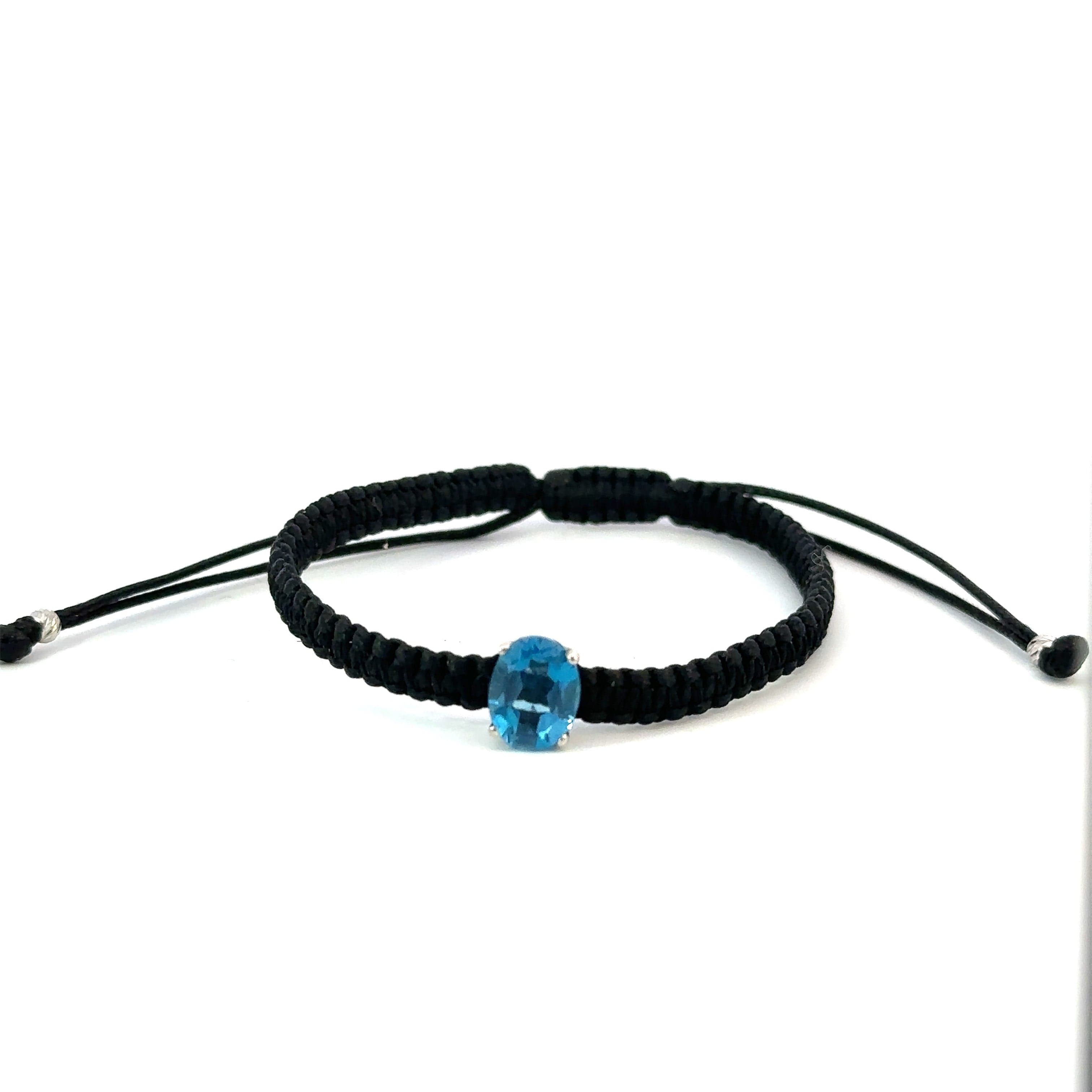 Braided bracelet 14KWGold s/w Blue Topaz